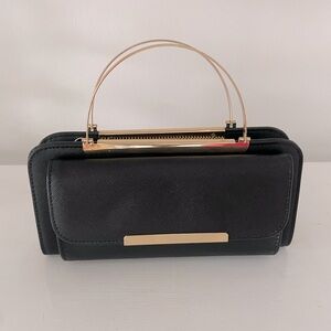 Multi style Wallet, Wristlet, crossbody bag in Peta approved Vegan leather.